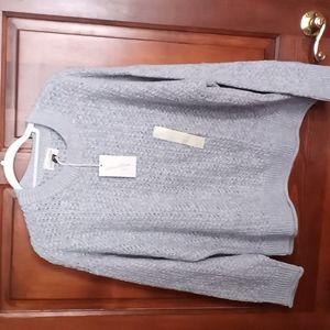 Sweater size XL. The color is blue/gray. Smoke free home.